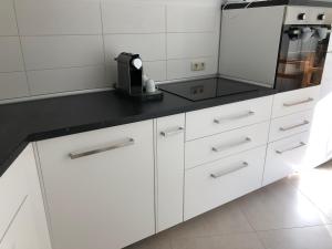 Sonnige Wohnung im Zentrum mit Terrasse u Tiefgarage - Netflix - Prime - Disney