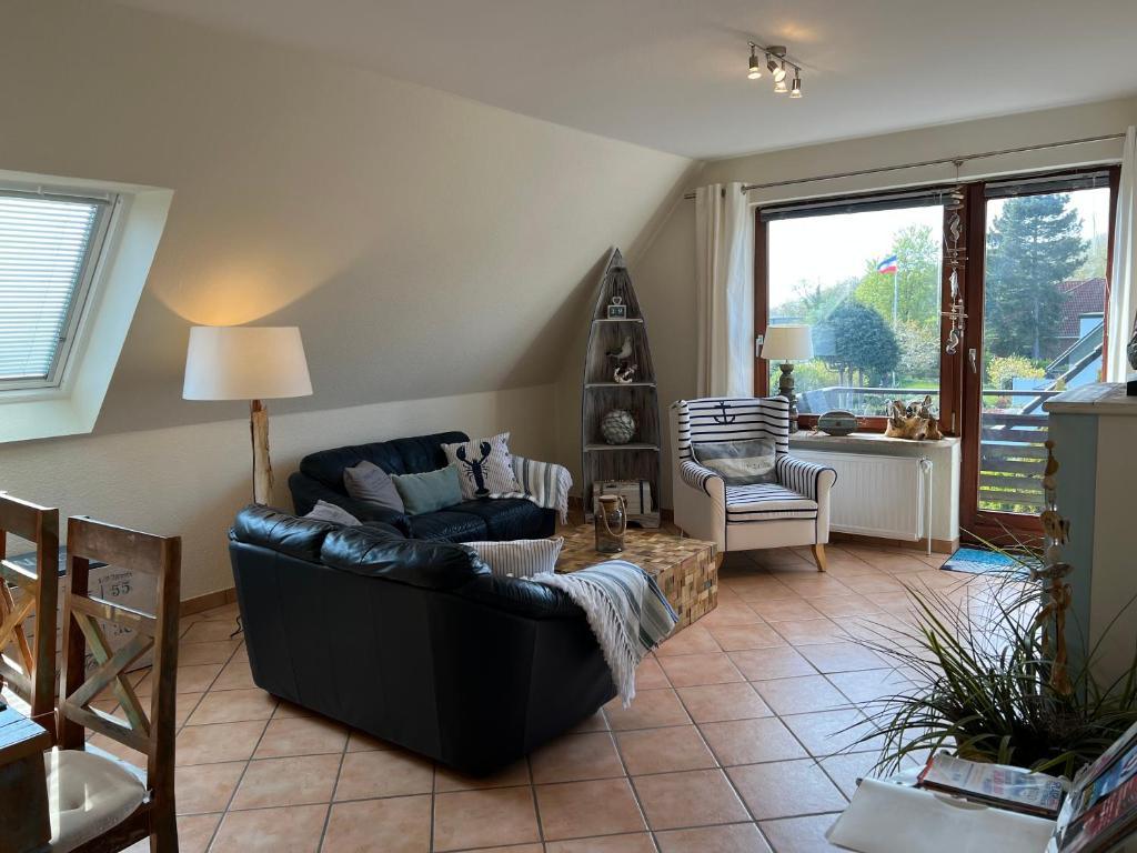 STOE12a Ferienhaus Sonne, Wohnung Sonnenaufgang Störtebeker Weg 12, 23669 Häven
