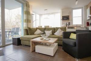 Strandpark-Grossenbrode-Haus-Kuestenzauber-Wohnung-15-KAePTNs-KAJUeTE