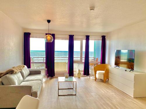 Studio-Apartment mit Panorama-Meerblick und direkter Strandlage in Scharbeutz