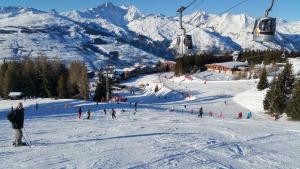Studio Arc 1800 Skis aux Pieds