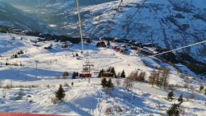 Studio Arc 1800 Skis aux Pieds