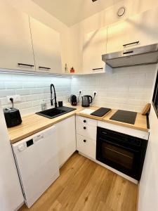 Studio avec grande terrasse et parking privatifs