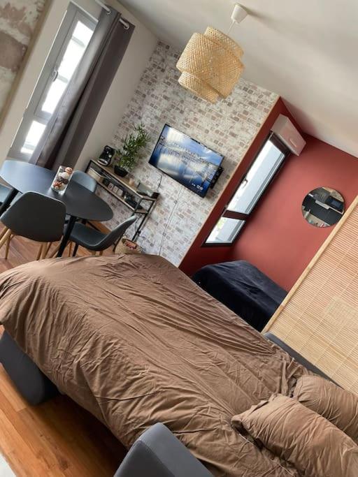 Studio avec toit terrasse privé, en centre ville