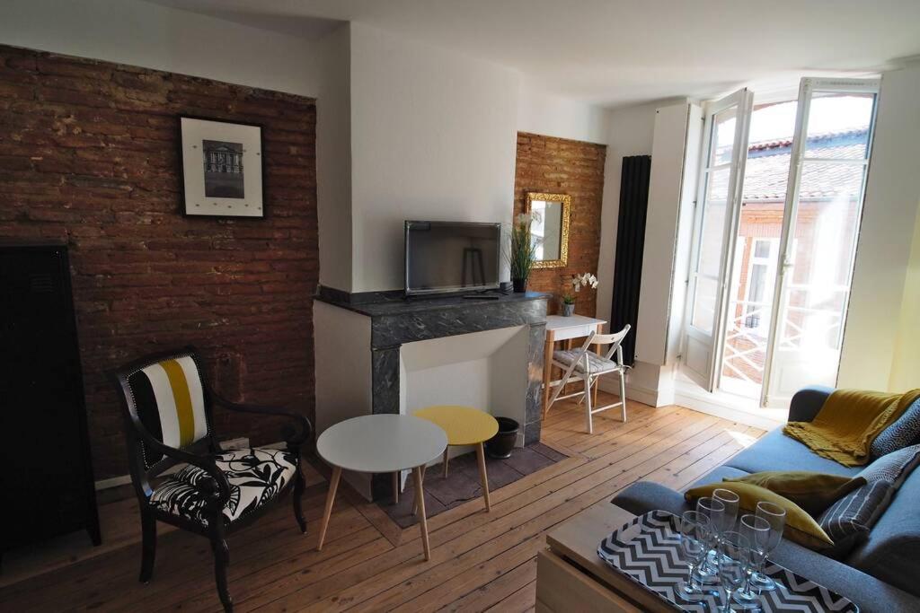 Appartement STUDIO BRICK AND WOOD - HYPERCENTRE - TV - WIFI Appartement 15 7 Rue des Puits Clos 31000 Toulouse