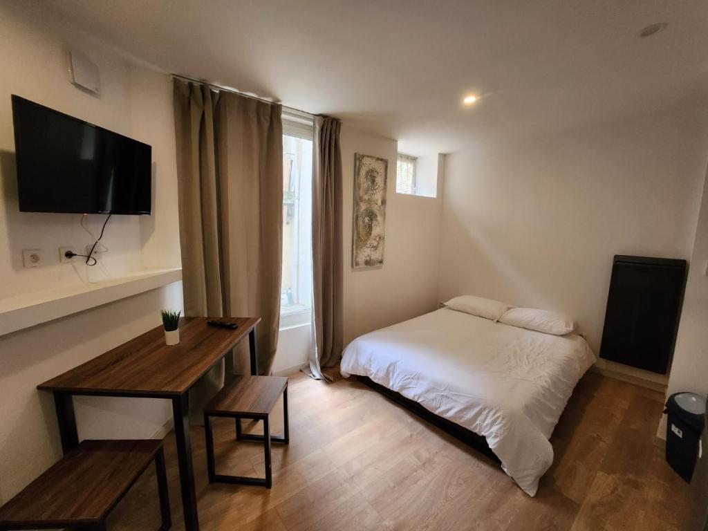 Appartement Studio calme rdc coté cours Appt. 03 54, rue du coq 55000 Bar-le-Duc