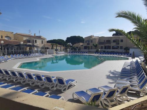 Studio climatisé cosy avec grande piscine chauffée