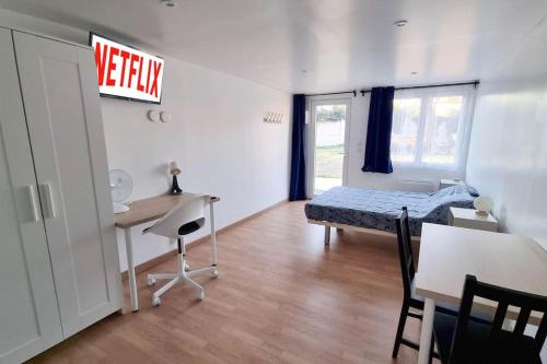 Studio en rez de jardin avec terrasse privée