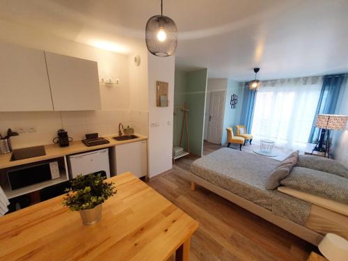 Studio fonctionnel au calme avec garage individuel et balcon
