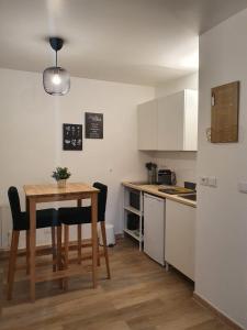 Studio fonctionnel au calme avec garage individuel et balcon
