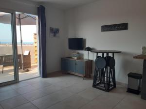 Studio les pieds dans l'eau vue sur mer