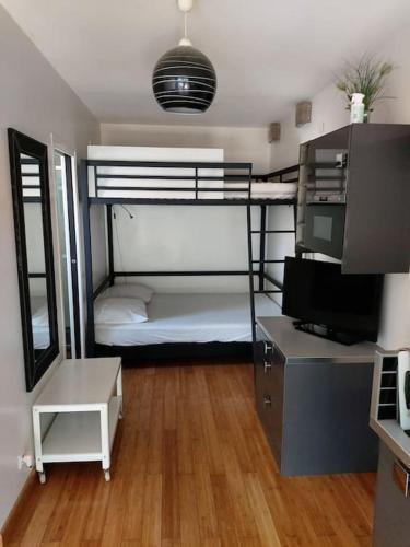 STUDIO LUXE 600M PLAGE AVEC SPA POUR 4 PERS