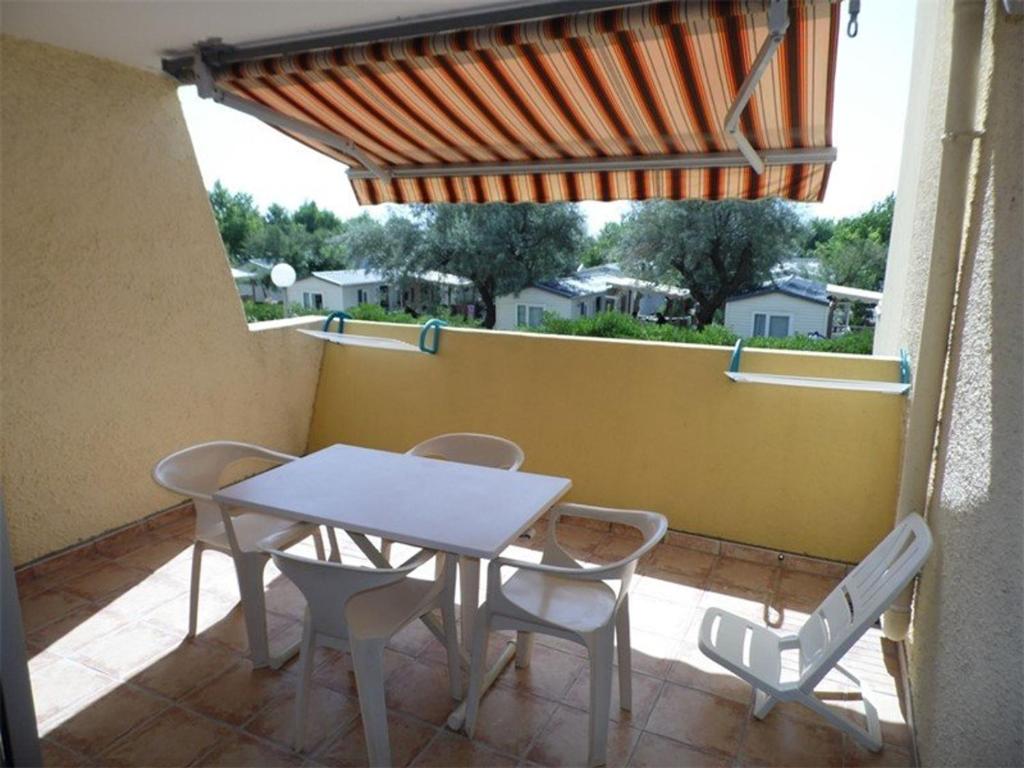 Appartement Studio Marseillan-Plage, 1 pièce, 2 personnes - FR-1-326-506 Chemin De L'Airette -  - 34340 Le Castellas