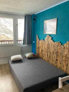 Studio mongie aux pieds des pistes avec balcon