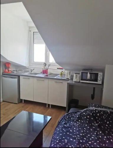 Studio n13 en plein centre ville bruat