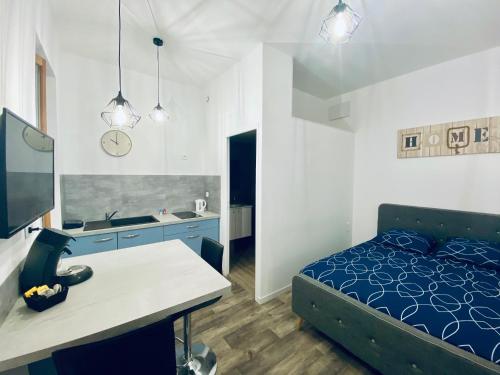 Studio neuf bien placé, jardin et parking gratuit