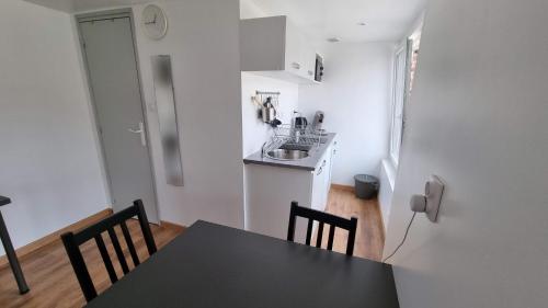 Studio - rez-de-chaussée - wifi - télévision