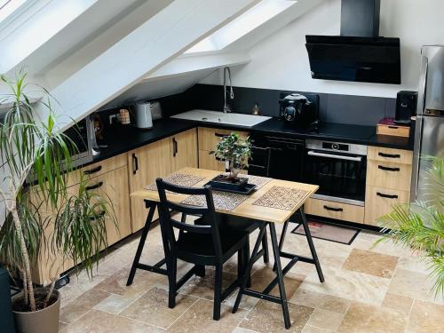 Studio sous combles avec prestation haut de gamme