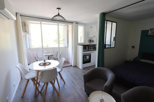 Studio tout confort - Climatisation, parking, wifi