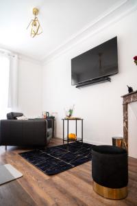 Suite L'éclipse Paris, logement avec jacuzzi, à 10 minutes des Champs Elysées