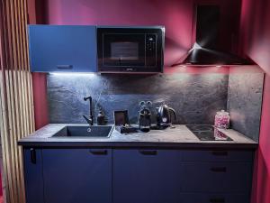 Suite Rouge baiser - Spa & Jacuzzi - Insolite à Saint Etienne