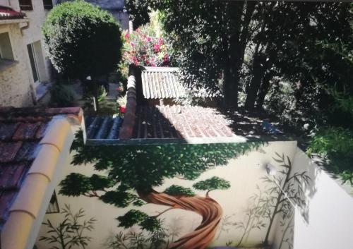 Suite Volupté classée 3 étoiles avec vue sur Jardins, Garage et Climatisation