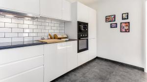Sunny Duplex W/ Pool & Balcony by LovelyStay