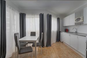 Sunny Flat W/ Balcony & Pool by LovelyStay