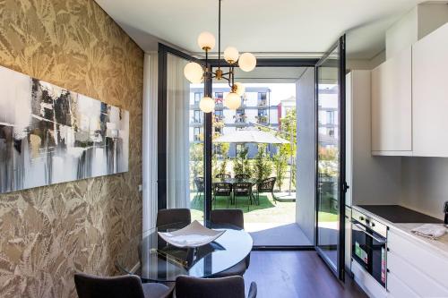 Superb 1BR Flat w/ Garden, AC & Free Parking by LovelyStay