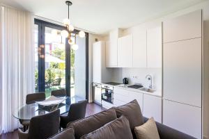 Superb 1BR Flat w/ Garden, AC & Free Parking by LovelyStay