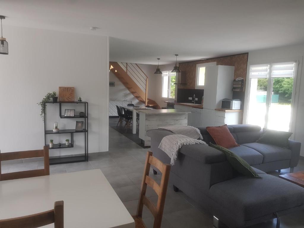 Superbe appartement avec Patio commun