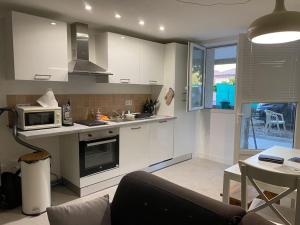 Superbe appartement dans villa avec Jardin
