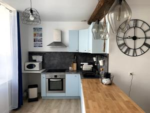 Superbe duplex centre-ville avec parking gratuit