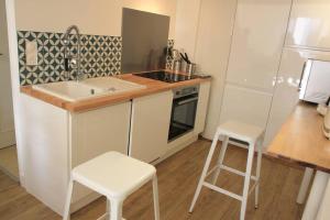 Superbe DUPLEX de 70m2 avec 2 CHAMBRES en HYPER CENTRE au CALME sur COUR classé 3 ETOILES avec PARKING en option