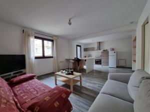T2 avec terrasse 25m², garage, plein centre-ville