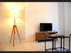 T2 en RDC style industriel en centre ville \