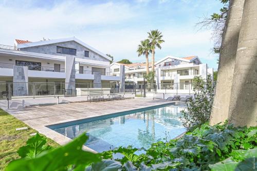T2 NEUF A4 RDJ-PISCINE–ACCÈS DIRECT PLAGES ET CENTRE VILLAGE–