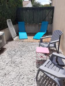 T2 Rez de chaussée climatisé jardin parking privé