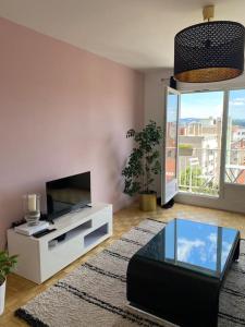 T3 Hypercentre-dernier étage-Balcon-Garage-Queen beds-vue panoramique
