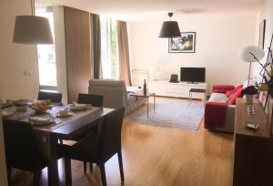 The River's Whisper Apartment