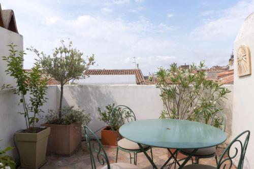 Triplex apartment with furnished rooftop terrace in the heart of the city