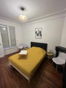 Un appartement authentique à deux pas de Paris .