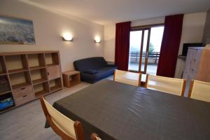 Appartement VAUJANYLOCATIONS - COCHETTE 1 APT 2 Place de la Fare 38114 Vaujany Rhône-Alpes