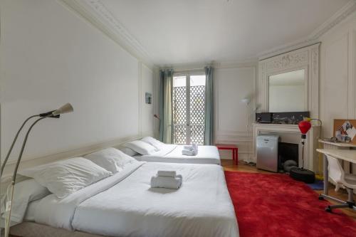 Veeve - Balcony Bliss steps from the Bois de Boulogne