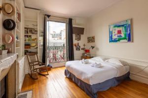 Veeve - Balcony Bliss steps from the Bois de Boulogne