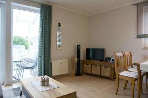 Villa Karola FeWo 18 mit Balkon in zentraler Lage