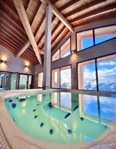 Appartement Vue panoramique sur les montagnes plein Sud - T2 Skis aux pieds, Piscine, Jacuzzi Les Portes du Grand Massif - Résidence du Golf, lieu dit les gérats, FLAINE 74300 Flaine Rhône-Alpes