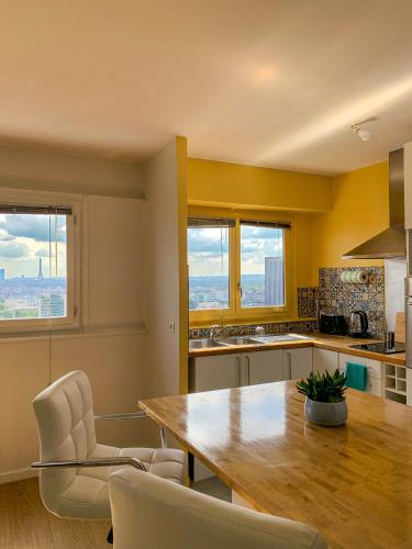 Vue panoramique sur Paris : Sublime appartement au centre de Courbevoie