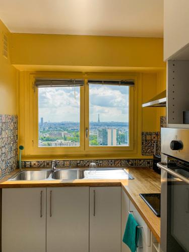 Vue panoramique sur Paris : Sublime appartement au centre de Courbevoie