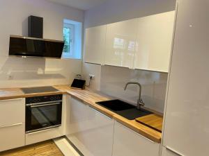 WH Immobilien Design City Appartement Rainshower